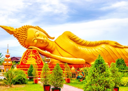 Pha That Luang golden stupa and Wat That Luang Tai temple