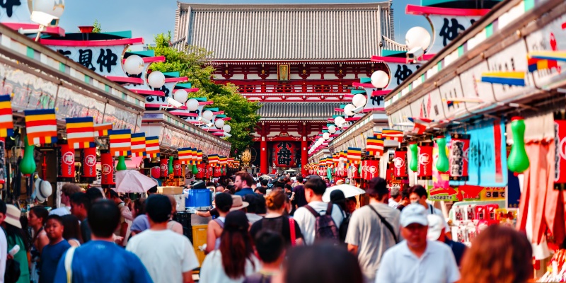 Crowds of tourists and locals pack Nakamise Dori Street