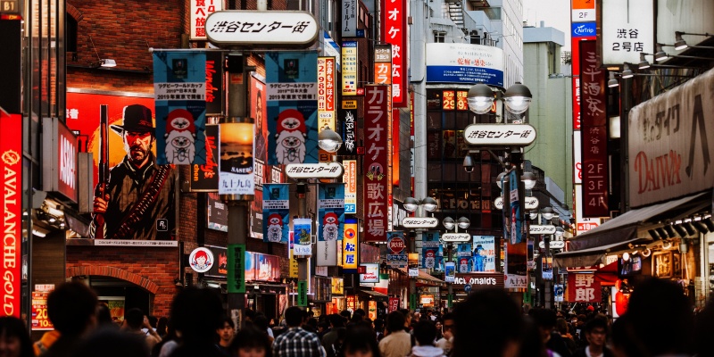 crowds and road traffic in Shibuya district in Tokyo